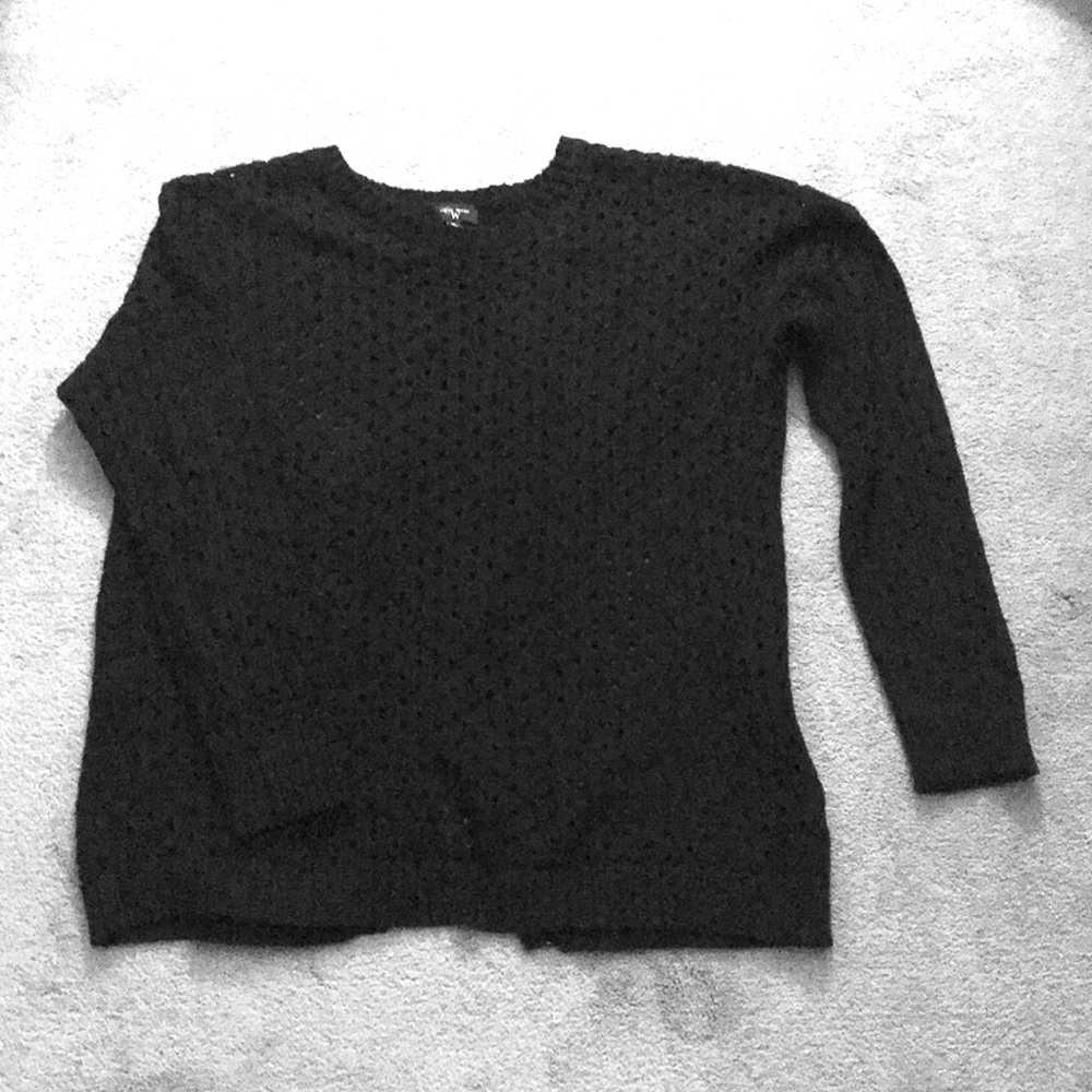 Black sweater with holes throughout